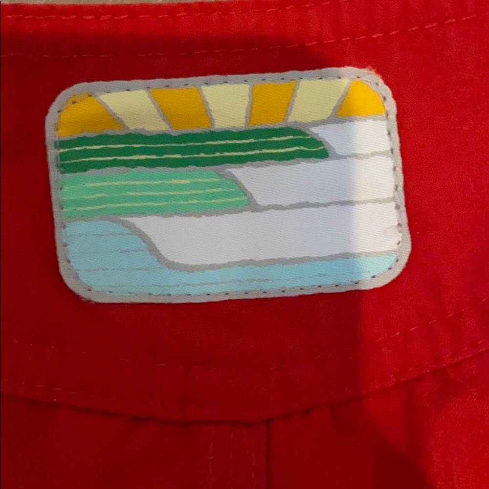Red swim trunks with blue lining and pocket detail - Picture 4 of 4